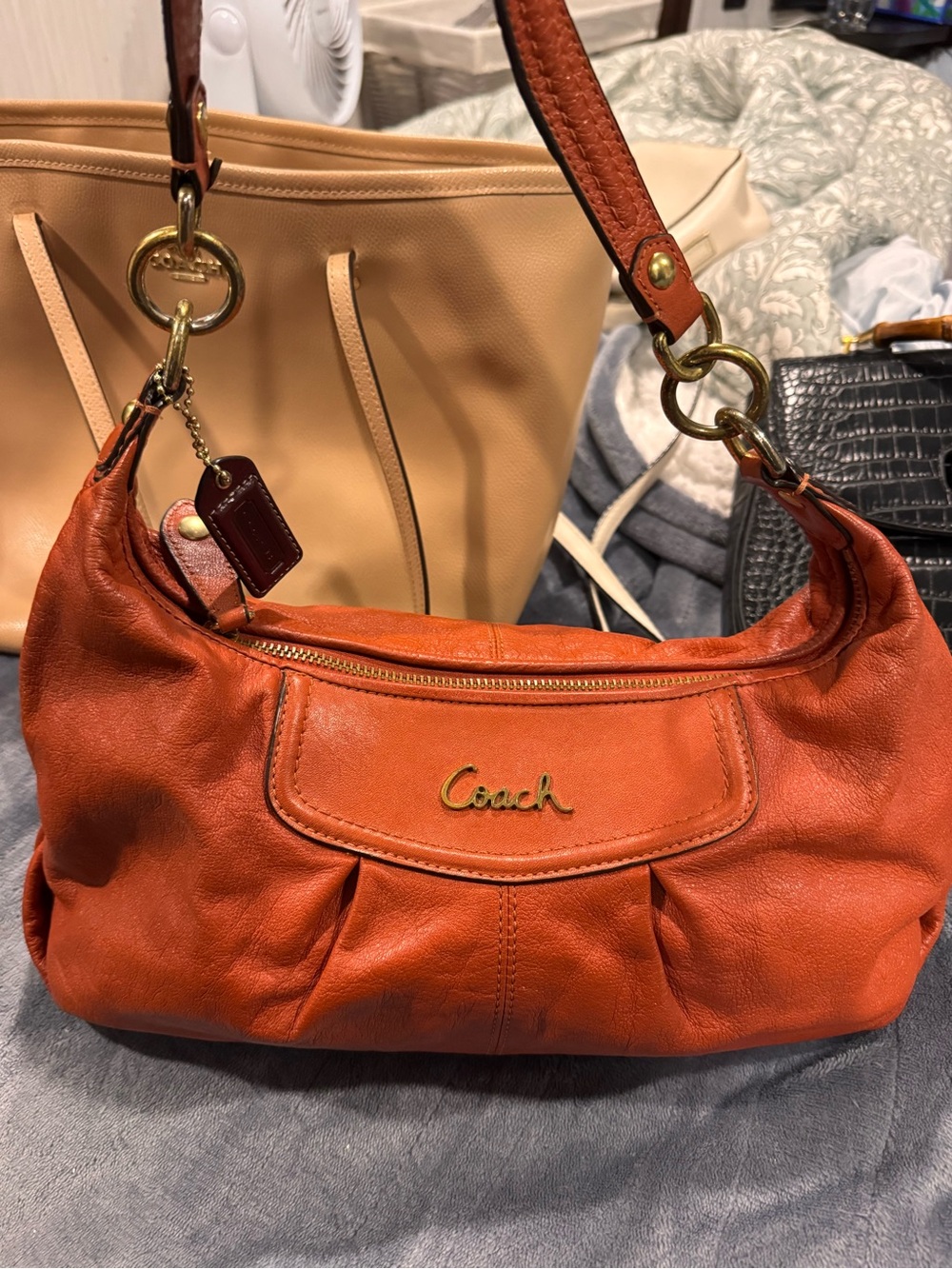 Coach Orange Leather Shoulder Bag with Burgundy Tag; Like new.